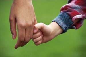Father and Daughter holding hands